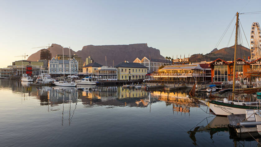 Which shampoo and conditioner are best for dry, curly hair in Cape Town's weather? 2 VA Waterfront b